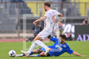 2022-10-15 - Carlos Augusto (AC Monza) and Petar Stojanovic (Empoli FC) - EMPOLI FC VS AC MONZA - ITALIAN SERIE A - SOCCER