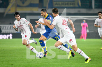 2022-10-16 - Verona's Koray Gunter in action against Milan's Sandro Tonali and Milan's Matteo Gabbia - HELLAS VERONA FC VS AC MILAN - ITALIAN SERIE A - SOCCER
