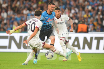 2022-10-16 - Matteo Politano of SSC Napoli  Andrea Cambiaso of Bologna FC  competes for the ball with  during the Serie A match between US Salernitana 1919 and Hellas Verona FC  at Stadio Arechi   - SSC NAPOLI VS BOLOGNA FC - ITALIAN SERIE A - SOCCER