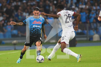 2022-10-16 - Jhon Lucumí of Bologna FC  Matteo Politano of SSC Napoli  competes for the ball with  during the Serie A match between US Salernitana 1919 and Hellas Verona FC  at Stadio Arechi   - SSC NAPOLI VS BOLOGNA FC - ITALIAN SERIE A - SOCCER