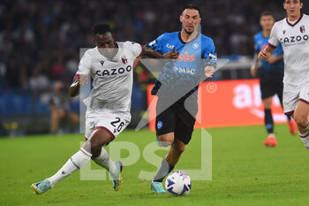 2022-10-16 - Jhon Lucumí of Bologna FC  Matteo Politano of SSC Napoli  competes for the ball with  during the Serie A match between US Salernitana 1919 and Hellas Verona FC  at Stadio Arechi   - SSC NAPOLI VS BOLOGNA FC - ITALIAN SERIE A - SOCCER