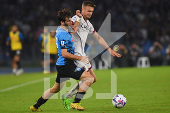 2022-10-16 - Khvicha Kvaratskhelia of SSC Napoli  and Stefan Posch of Bologna FC  competes for the ball with  during the Serie A match between US Salernitana 1919 and Hellas Verona FC  at Stadio Arechi   - SSC NAPOLI VS BOLOGNA FC - ITALIAN SERIE A - SOCCER