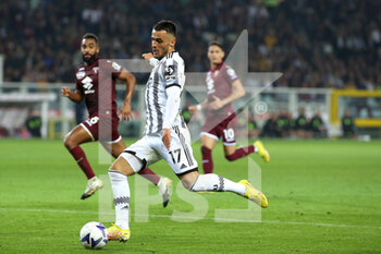 2022-10-15 - Filip Kostic (Juventus FC) in action, about to shoot the ball - TORINO FC VS JUVENTUS FC - ITALIAN SERIE A - SOCCER