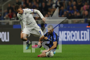 2022-10-29 - Henrikh Mkhitaryan of FC Internazionale competes for the ball with Filip Djuricic of UC Sampdoria during Serie A 2022/23 football match between FC Internazionale and UC Sampdoria at Giuseppe Meazza Stadium, Milan, Italy on October 29, 2022 - INTER - FC INTERNAZIONALE VS UC SAMPDORIA - ITALIAN SERIE A - SOCCER