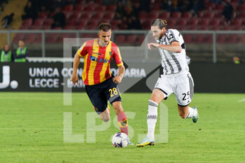 2022-10-29 - Adrien Rabiot (Juventus) and Remi Oudin (US Lecce) - US LECCE VS JUVENTUS FC - ITALIAN SERIE A - SOCCER