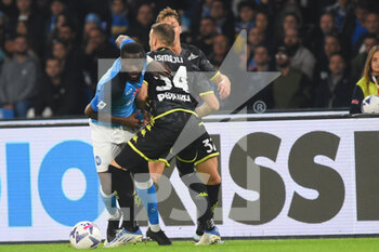 2022-11-08 - Ardian Ismajli of Empoli Football Club and Tanguy Ndombele' of SSC Napoli  competes for the ball with  during the Serie A match between SSC Napoli v Empoli Football Club at  Diego Armando Maradona Stadium - SSC NAPOLI VS EMPOLI FC - ITALIAN SERIE A - SOCCER