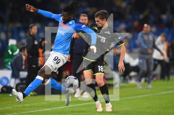 2022-11-08 - Andre' Anguissa of SSC Napoli  and Răzvan Marin of Empoli Football Club competes for the ball with during the Serie A match between SSC Napoli v Empoli Football Club at  Diego Armando Maradona Stadium - SSC NAPOLI VS EMPOLI FC - ITALIAN SERIE A - SOCCER