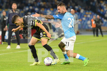 2022-11-08 - Matteo Politano of SSC Napoli  and Filippo Bandinelli of Empoli Football Club competes for the ball with during the Serie A match between SSC Napoli v Empoli Football Club at  Diego Armando Maradona Stadium - SSC NAPOLI VS EMPOLI FC - ITALIAN SERIE A - SOCCER