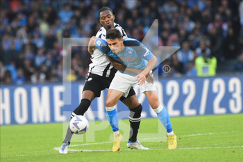 2022-11-12 - Eljif Elmas of SSC Napoli  and Kingsley Ehizibue of Udinese Calcio competes for the ball with  during the Serie A match between SSC Napoli  v Udinese Calcio at Diego Armando Maradona Stadium  - SSC NAPOLI VS UDINESE CALCIO - ITALIAN SERIE A - SOCCER