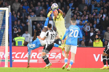 2022-11-12 - Marco Silvestri of Udinese Calcio  Victor Osimhen of SSC Napoli  competes for the ball with  during the Serie A match between SSC Napoli  v Udinese Calcio at Diego Armando Maradona Stadium  - SSC NAPOLI VS UDINESE CALCIO - ITALIAN SERIE A - SOCCER
