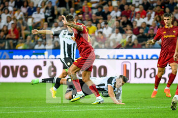 2022-09-04 - Foul of Roma's Lorenzo Pellegrini on Udinese's Lazar Samardzic - UDINESE CALCIO VS AS ROMA - ITALIAN SERIE A - SOCCER