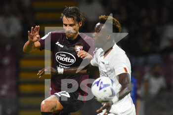 2022-08-14 - Tammy Abraham( AS. Roma) and Antonio Candreva ( US. Salernitana 1919) competes for the ball withduring the Serie A 2022/23 match between US Salernitana1919 and AS Roma  Arechi  Stadium - US SALERNITANA VS AS ROMA - ITALIAN SERIE A - SOCCER