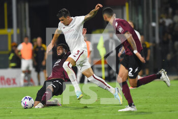 2022-08-14 - Roger Ibañez ( AS. Roma) and Lassana Coulibaly( US. Salernitana 1919) competes for the ball withduring the Serie A 2022/23 match between US Salernitana1919 and AS Roma  Arechi  Stadium - US SALERNITANA VS AS ROMA - ITALIAN SERIE A - SOCCER