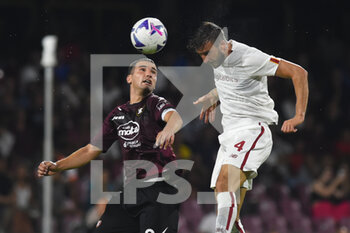 14/08/2022 - Bryan Cristante ( AS. Roma) and Federico Bonazzoli( US. Salernitana 1919) competes for the ball with during the Serie A 2022/23 match between US Salernitana1919 and AS Roma  Arechi  Stadium - US SALERNITANA VS AS ROMA - SERIE A - CALCIO