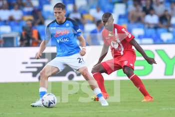 2022-08-21 - Piotr Zieliński (SSC Napoli) and Marlon  ( AC Monza) competes for the ball with during the Serie A 2022/23 match between SSC Napoli And AC Monza Diego Armando Maradona Stadium - SSC NAPOLI VS AC MONZA - ITALIAN SERIE A - SOCCER