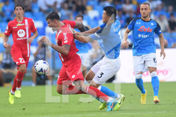 2022-08-21 - Kim Min-Jae (SSC Napoli) and Andrea Petagna (AC Monza) competes for the ball with during the Serie A 2022/23 match between SSC Napoli And AC Monza Diego Armando Maradona Stadium - SSC NAPOLI VS AC MONZA - ITALIAN SERIE A - SOCCER