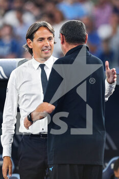 2022-08-26 - Simone Inzaghi head coach of Internazionale (L) and Maurizio Sarri head coach of Lazio greet each other before the Italian championship Serie A football match between SS Lazio and FC Internazionale on August 26, 2022 at Stadio Olimpico in Rome, Italy - FOOTBALL - ITALIAN CHAMP - LAZIO V INTERNAZIONALE - ITALIAN SERIE A - SOCCER