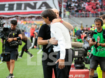 2022-09-03 - Coach Stefno Pioli (Ac Milan) and Coach Simone Inzaghi of Fc Inter during the Italian Serie A tootball match between Ac Milan and Fc Inter on 03 of September 2022 at Giuseppe Meazza _ San Siro Siro stadium in Milan, Italy. Photo Nderim Kaceli - AC MILAN VS INTER - FC INTERNAZIONALE - ITALIAN SERIE A - SOCCER