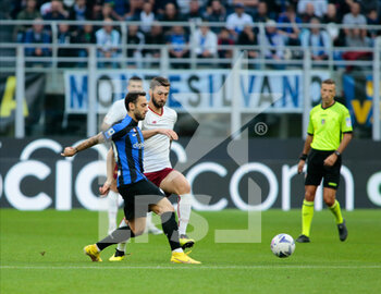 2022-10-01 - Hakan Calhanoglu of Fc Inter and Bryan Cristante of As Roma during the Italian Serie A, Football match between Fc Inter and As Roma on October 1, 2022 at San Siro Stadium, Milan, Italy. Photo Nderim Kaceli - INTER - FC INTERNAZIONALE VS AS ROMA - ITALIAN SERIE A - SOCCER