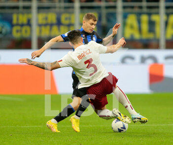 2022-10-01 - Roger Ibanez of As Roma and Nicolo Barrella of Fc Inter during the Italian Serie A, Football match between Fc Inter and As Roma on October 1, 2022 at San Siro Stadium, Milan, Italy. Photo Nderim Kaceli - INTER - FC INTERNAZIONALE VS AS ROMA - ITALIAN SERIE A - SOCCER