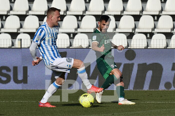 2022-01-22 - Marius Marin (Pisa) in action hampered by Lorenzo Maria Dickmann (Spal) - SPAL VS AC PISA - ITALIAN SERIE B - SOCCER