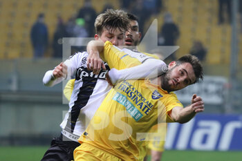2022-01-21 - Adrian Benedyczak of PARMA CALCIO competes for the ball with Przemyslaw of FROSINONE CALCIO during the Serie B match between Parma Calcio and Frosinone Calcio at Ennio Tardini on January 21, 2022 in Parma, Italy. - PARMA CALCIO VS FROSINONE CALCIO - ITALIAN SERIE B - SOCCER