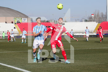 2022-02-12 - Lorenzo Colombo of Spal and Carlos Augusto of Monza contrasts the ball during the Serie B match between AC Monza vs Spal on February 12, 2022 at the U-Power Stadium in Monza - AC MONZA VS SPAL - ITALIAN SERIE B - SOCCER