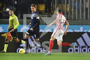 2022-02-15 - Lorenzo Lucca (Pisa) in action thwarted by Luca  Crecco (Vicenza) - AC PISA VS LR VICENZA - ITALIAN SERIE B - SOCCER