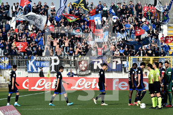 2022-02-19 - Players of Pisa enter the field in front of their fans - AC MONZA VS AC PISA - ITALIAN SERIE B - SOCCER