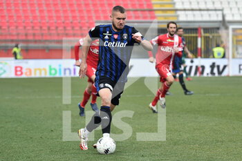 2022-02-19 - George Puscas (Pisa) in action - AC MONZA VS AC PISA - ITALIAN SERIE B - SOCCER