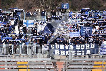 2022-02-26 - Brescia Calcio fans hold up their scarves - COMO 1907 VS BRESCIA CALCIO - ITALIAN SERIE B - SOCCER