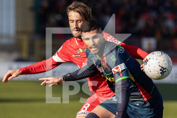 2022-02-27 - Andrea Barberis competes for the ball with Mario Gargiulo during the Serie B match between Monza and Lecce at U Power Stadium on February 27, 2022 in Monza, Italy. - AC MONZA VS US LECCE - ITALIAN SERIE B - SOCCER