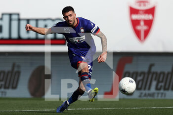 2022-03-19 - Pasquale Giannotti (Crotone) shoots the ball - AC MONZA VS FC CROTONE - ITALIAN SERIE B - SOCCER