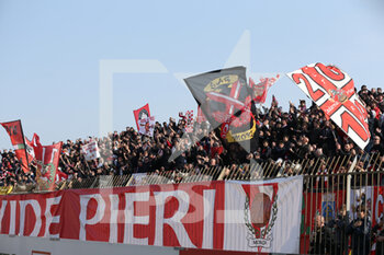 2022-03-19 - AC Monza supporters sing and celebrate clapping their hands and waving flags - AC MONZA VS FC CROTONE - ITALIAN SERIE B - SOCCER