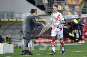 2022-04-09 - FROSINONE, ITALY - March 9 : Cristian Bonaiuto  (10)  of  Cremonese celebrates with his coach Fabio pecchia after scores  the opening  goal during soccer match between  Frosinone  and Cremonese at Stadio Benito Stirpe on March 9,2022 Frosinone Italy  - FROSINONE CALCIO VS US CREMONESE - ITALIAN SERIE B - SOCCER