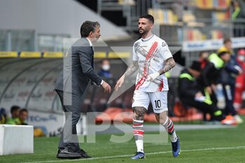 2022-04-09 - FROSINONE, ITALY - March 9 : Cristian Bonaiuto  (10)  of  Cremonese celebrates with his coach Fabio pecchia after scores  the opening  goal during soccer match between  Frosinone  and Cremonese at Stadio Benito Stirpe on March 9,2022 Frosinone Italy  - FROSINONE CALCIO VS US CREMONESE - ITALIAN SERIE B - SOCCER