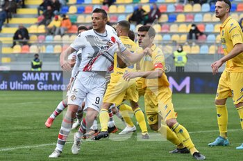 2022-04-09 - FROSINONE, ITALY -  March 9 : Daniel Ciofani (L) of  Cremonese in action against   Nicolo' Brighenti  (R) of Frosinone during the  Serie B  soccer match between  Frosinone and Cremonese Stadio Benito Stirpe on March 9,2022 in Frosinone Italy  - FROSINONE CALCIO VS US CREMONESE - ITALIAN SERIE B - SOCCER