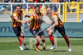 2022-04-25 - Fabio Lucioni (US Lecce) Mario Gargiulo (US Lecce) and Alexis Blin (US Lecce) celebrates after scoring a goal of 1-0 - US LECCE VS AC PISA - ITALIAN SERIE B - SOCCER