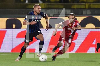 2022-05-29 - George Puscas (Pisa) in action hampered by Andrea  Barberis (Monza) - PLAY OFF - AC PISA VS AC MONZA - ITALIAN SERIE B - SOCCER