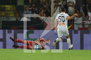 2022-08-28 - Nicolas David Andrade (Pisa) saves on Guven  Yalcin (Genoa) - AC PISA VS GENOA CFC - ITALIAN SERIE B - SOCCER