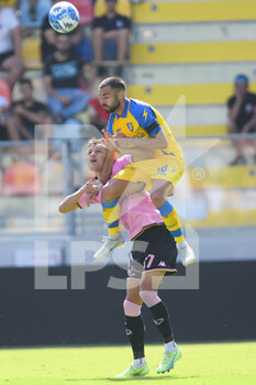 2022-09-17 - FROSINONE, ITALY -  September 17 :  Fabio Lucioni  (R) of  Frosinone in action against  Alex Mateju (L) of  Palermo during the  Serie B  soccer match between  Frosinone and Palermo Stadio Benito Stirpe on September 17,2022 in Frosinone Italy - FROSINONE CALCIO VS PALERMO FC - ITALIAN SERIE B - SOCCER