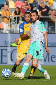 2022-10-08 - FROSINONE, ITALY -  October 8 :  Matteo Cotali  (L) of  Frosinone in action against  Niccolo' Zanellato (R) of  Spal during the  Serie B  soccer match between  Frosinone and Spal Stadio Benito Stirpe on October 8,2022 in Frosinone Italy - FROSINONE CALCIO VS SPAL - ITALIAN SERIE B - SOCCER