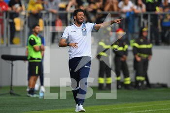 2022-10-22 - FROSINONE, ITALY - October 22 : Head Coach Fabio Grosso of Frosinone gestures during  Italian  Serie B soccer match between  Frosinone and Bari at Stadio Benito Stirpe 
on October 22,2022  in Frosinone Italy  - FROSINONE CALCIO VS SSC BARI - ITALIAN SERIE B - SOCCER
