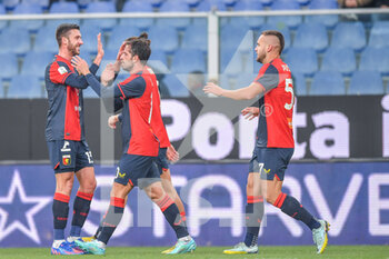 2022-12-08 - Mattia Bani, Mattia Aramu, Radu Matei Dragusin and George Alexandru Puscas (Genoa) celebrates after scoring a goal 1 - 0 - GENOA CFC VS FC SUDTIROL - ITALIAN SERIE B - SOCCER