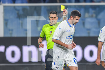 2022-12-18 - The Referee of the match Simone Sozza to Seregno
 Yellow card for Luca Ravanelli (Frosinone) - GENOA CFC VS FROSINONE CALCIO - ITALIAN SERIE B - SOCCER