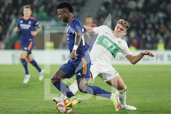 2022-01-20 - Vinicius Junior of Real Madrid and Raul Guti of Elche during the Spanish Cup, Copa del Rey, round of 16 football match between Elche CF and Real Madrid on January 20, 2022 at Martinez Valero stadium in Elche, Alicante, Spain - ELCHE CF VS REAL MADRID - SPANISH CUP - SOCCER