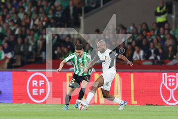2022-04-23 - Alex Moreno of Real Betis and Dimitri Foulquier of Valencia during the Spanish Cup, Copa del Rey, Final football match between Real Betis Balompie and Valencia CF on April 23, 2022 at Estadio de la Cartuja in Sevilla, Spain - FINAL - REAL BETIS BALOMPIE VS VALENCIA CF - SPANISH CUP - SOCCER