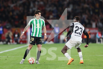 2022-04-23 - Hector Bellerin of Real Betis and Ilaix Moriba of Valencia during the Spanish Cup, Copa del Rey, Final football match between Real Betis Balompie and Valencia CF on April 23, 2022 at Estadio de la Cartuja in Sevilla, Spain - FINAL - REAL BETIS BALOMPIE VS VALENCIA CF - SPANISH CUP - SOCCER