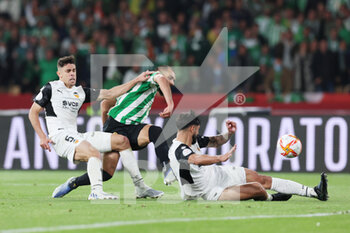 2022-04-23 - Borja Iglesias of Real Betis and Gabriel Paulista of Valencia in action during the Spanish Cup, Copa del Rey, Final football match between Real Betis Balompie and Valencia CF on April 23, 2022 at Estadio de la Cartuja in Sevilla, Spain - FINAL - REAL BETIS BALOMPIE VS VALENCIA CF - SPANISH CUP - SOCCER