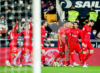 2022-01-19 - Players of Sevilla celebrate an own goal scored by Mouctar Diakhaby of Valencia during the Spanish championship La Liga football match between Valencia CF and Sevilla FC on January 19, 2022 at the Mestalla Stadium in Valencia, Spain - VALENCIA CF VS SEVILLA FC - SPANISH LA LIGA - SOCCER